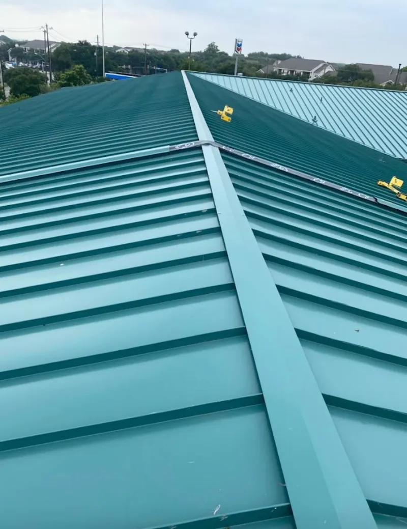 Green commercial metal roof ridge and valley for Metal Roof Repair in New Haven