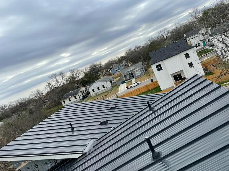 Standing seam metal roof panels with vents for Skylight Repair in New Haven